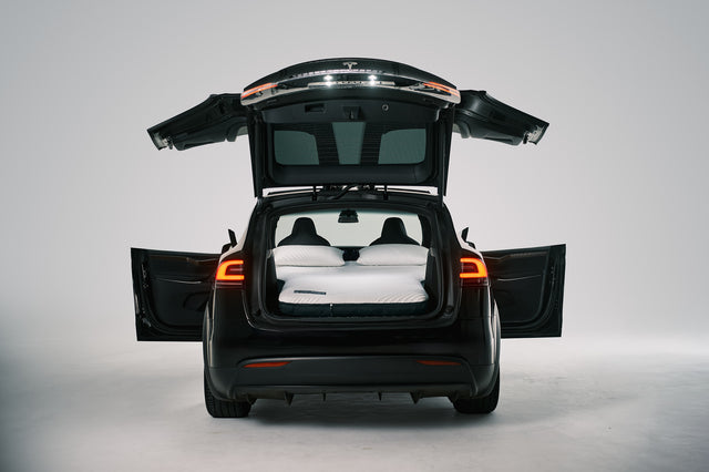 Snuuzu Tesla Model X car camping mattress shown fully set up for sleeping, designed for perfect fit and comfort during road trips and camping.